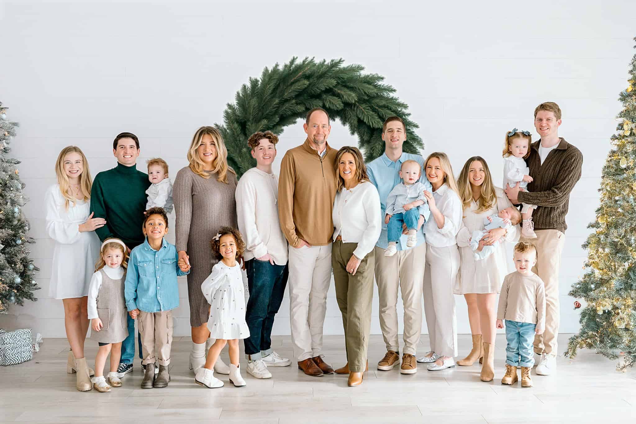 Vibrant family portrait with holiday decor for professional photoshoot.